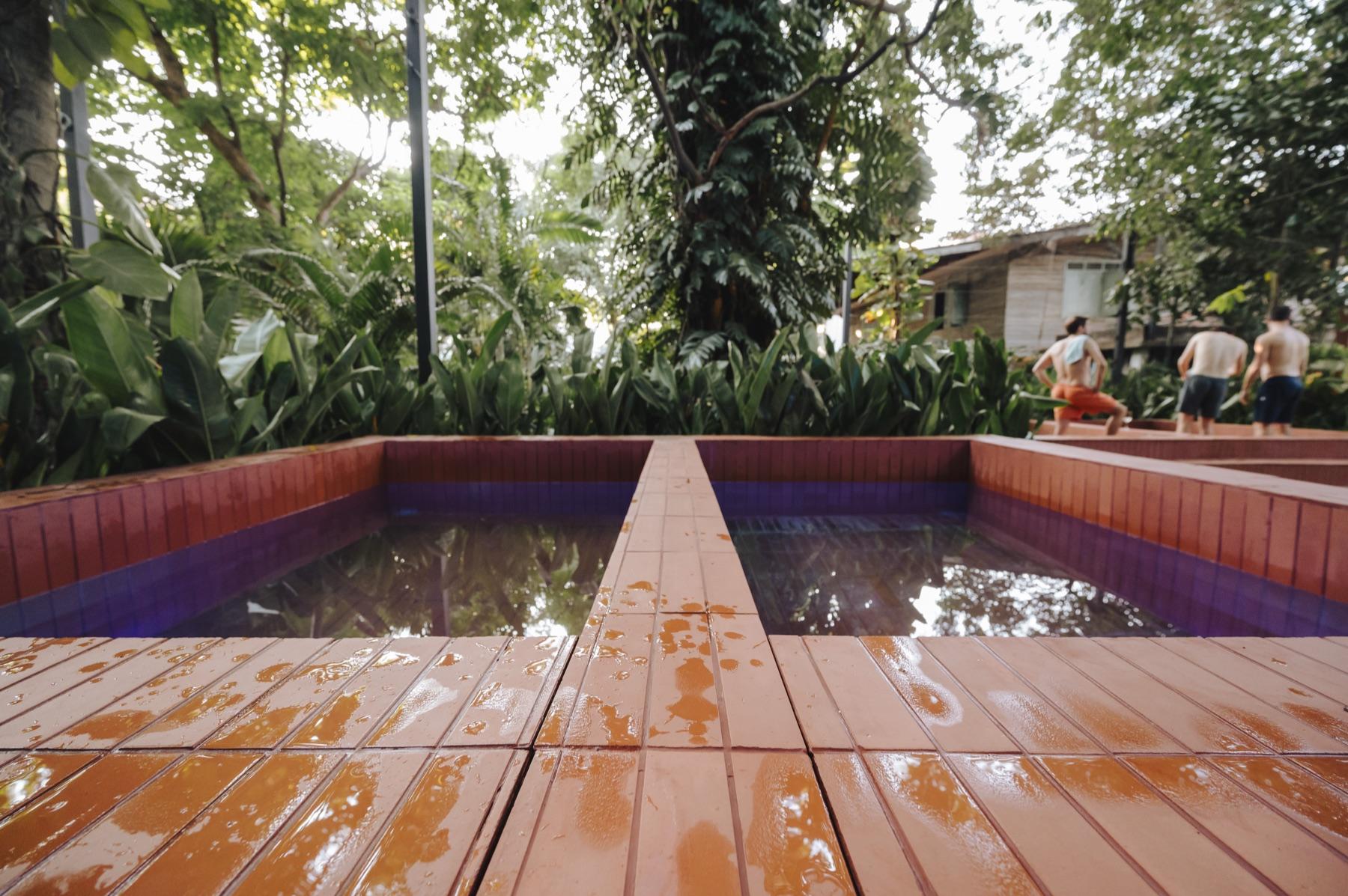 The two tiled cold pools in Dip Ari’s tropical garden